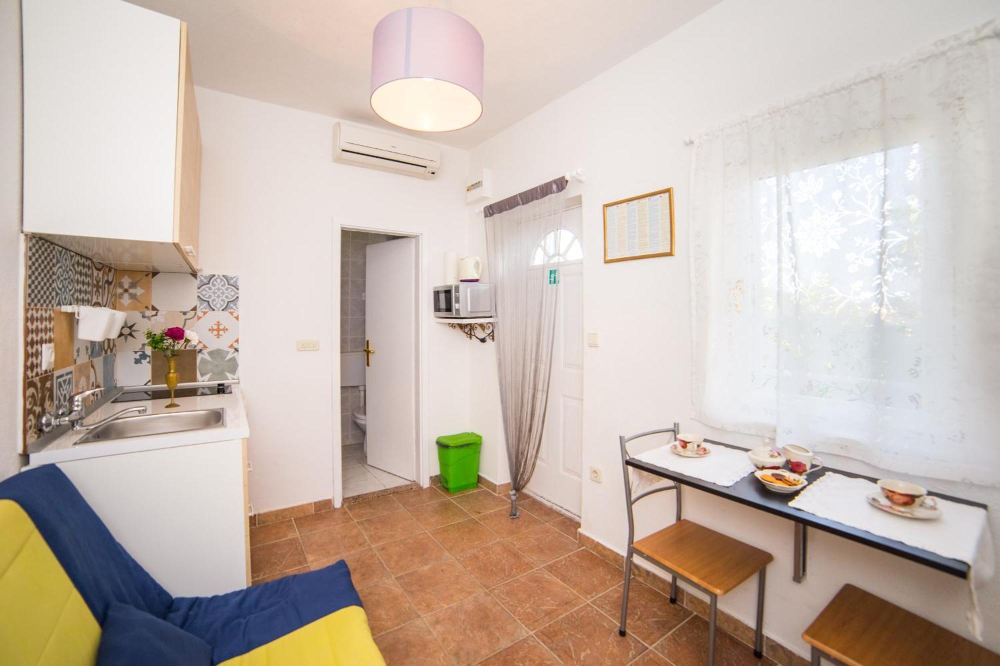 Apartmani Kala Podgora Oda fotoğraf